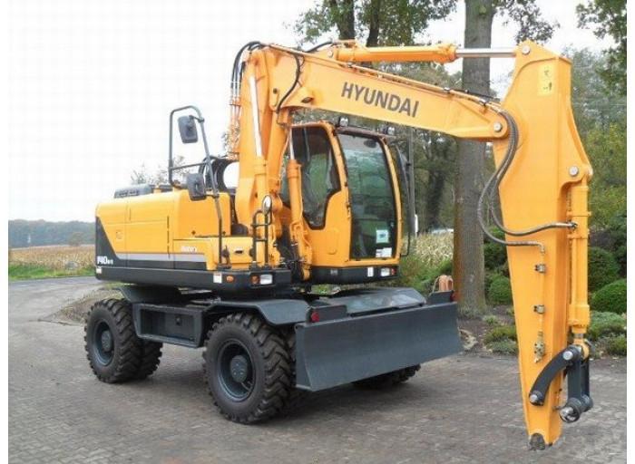 Колесный экскаватор с гидромолотом Hyundai R210W-9S